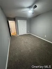 an empty room with a empty space and windows