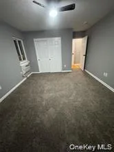 an empty room with a empty space and windows