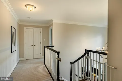 a view of hallway with stairs
