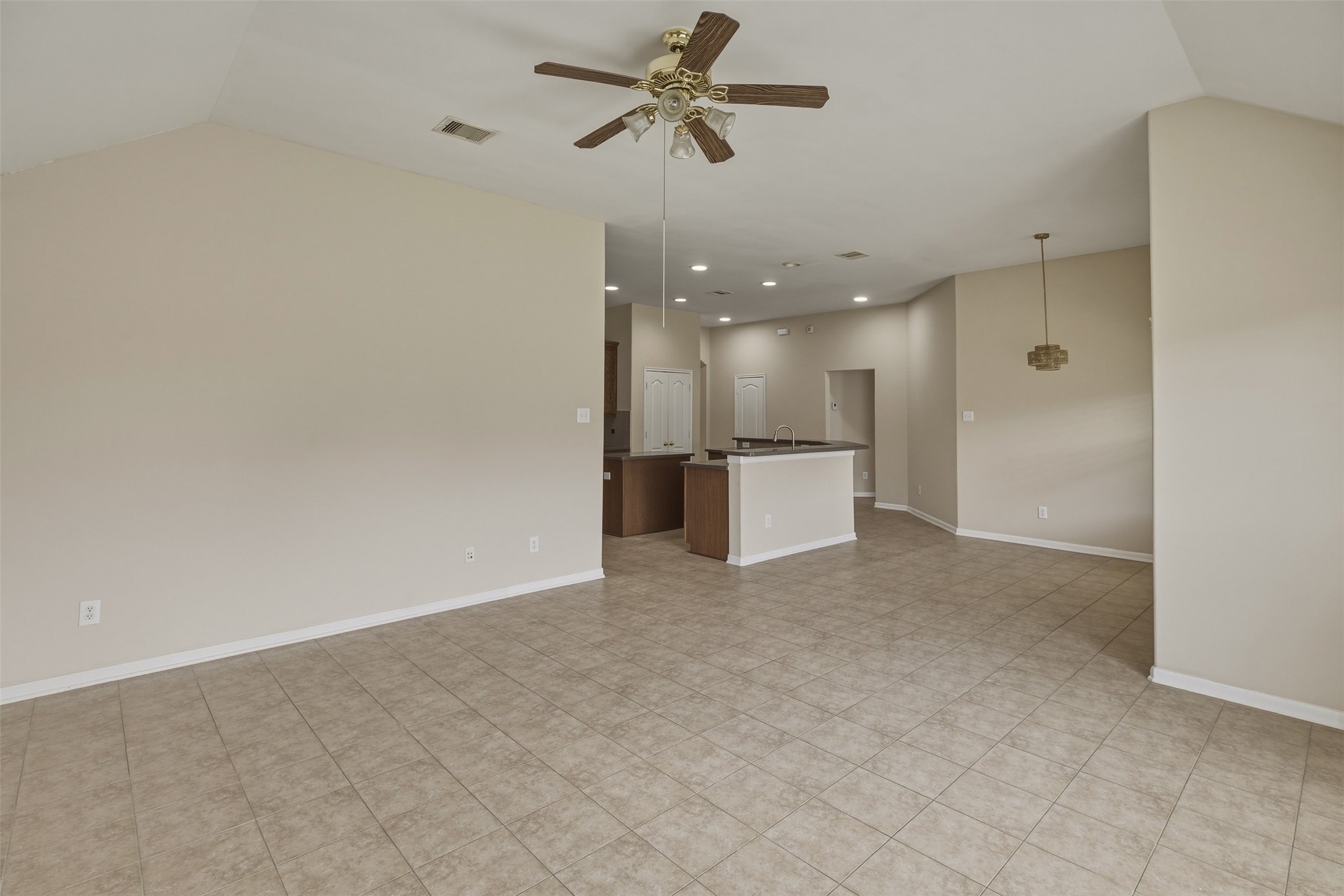 8515 Clarkman Ridge Lane Cypress, TX 77433 - Photo 15 of 31 8515-clarkman-ridge-ln-cypress-tx-living-room-kitchen-breakfast-nook