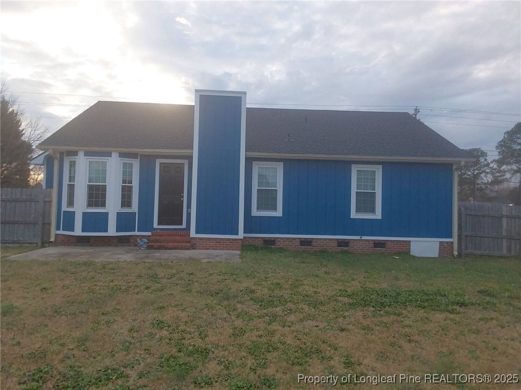 8249 Rockfish Road Raeford, NC 28376 - Photo 12 of 12 a house view with a garden
