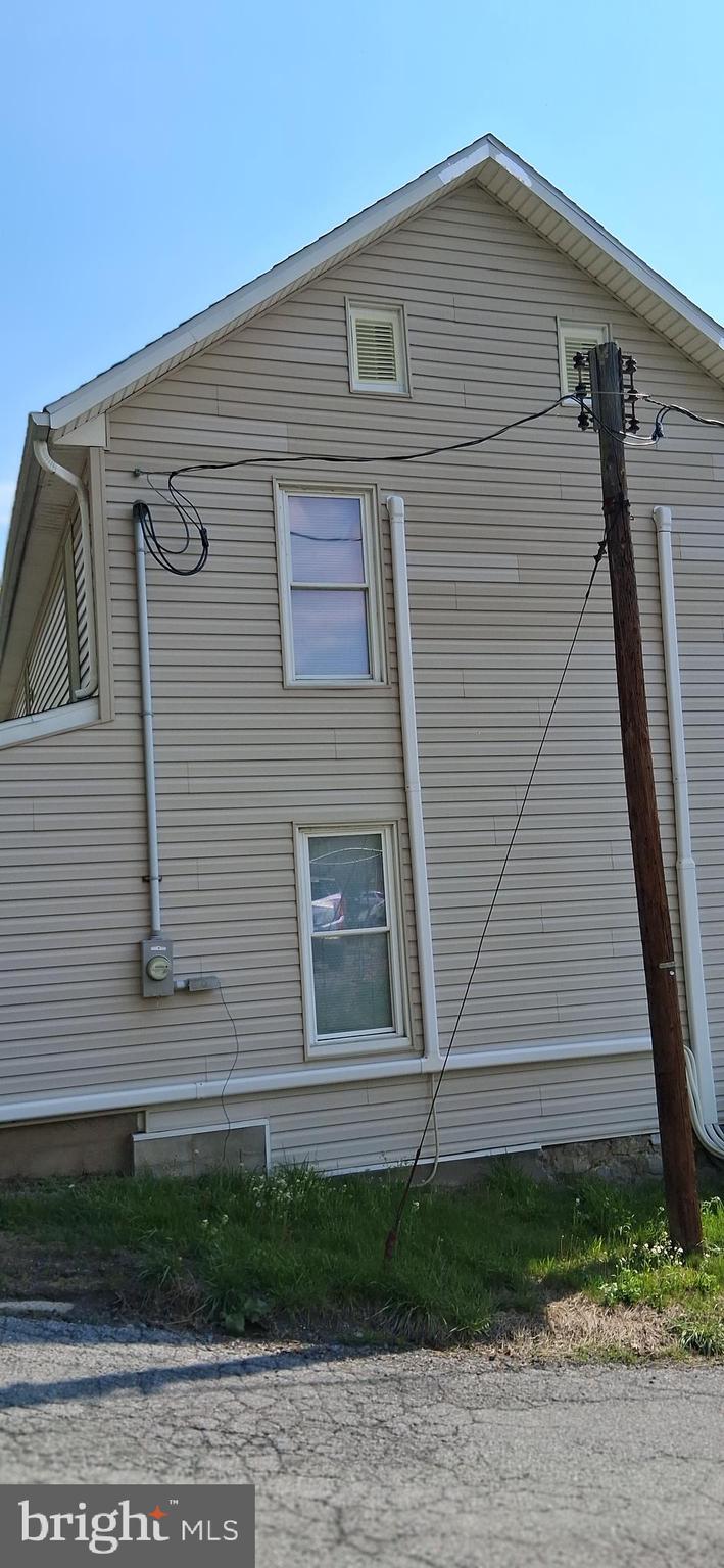 327-329 West Main Street Everett, PA 15537 - Photo 11 of 81 a front view of a house with a yard
