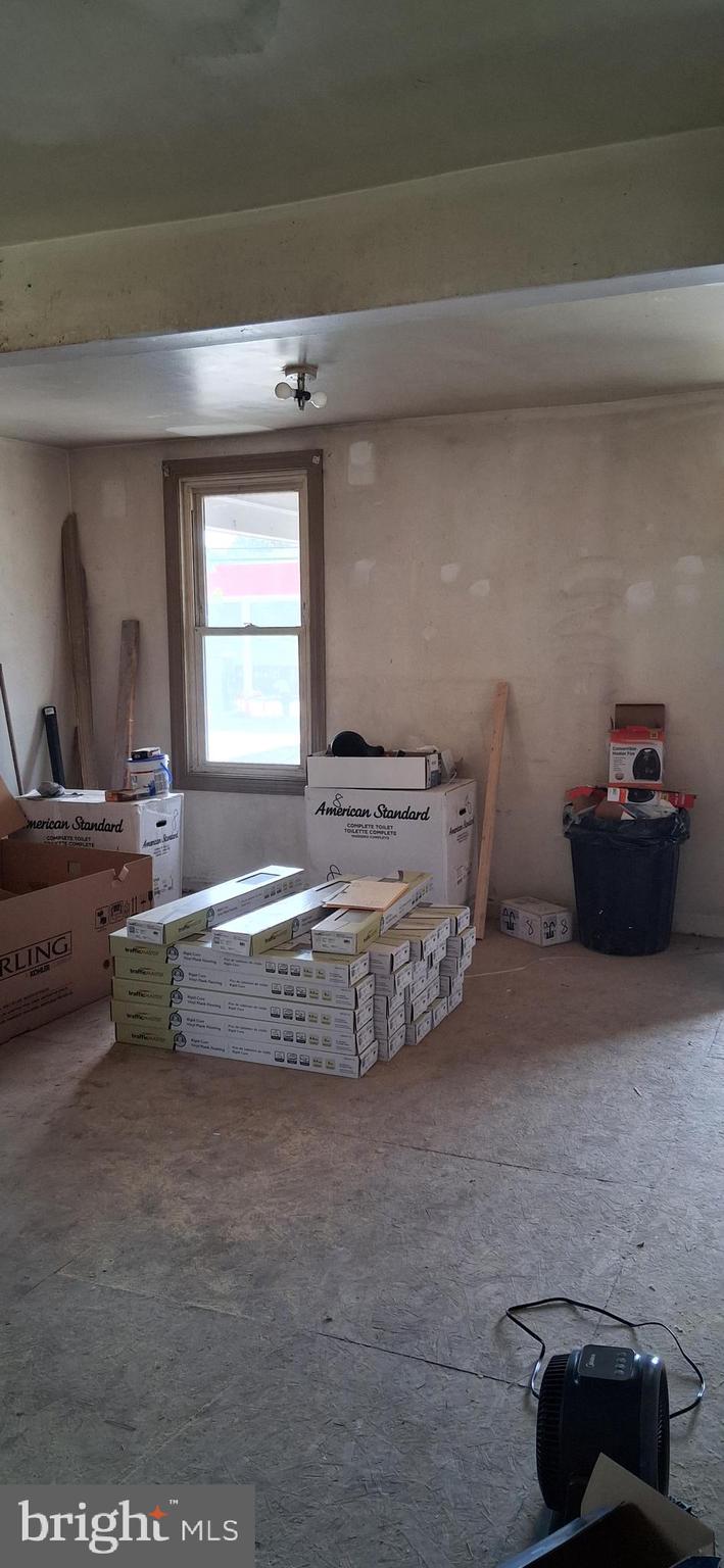 327-329 West Main Street Everett, PA 15537 - Photo 37 of 81 a living room with furniture and a window