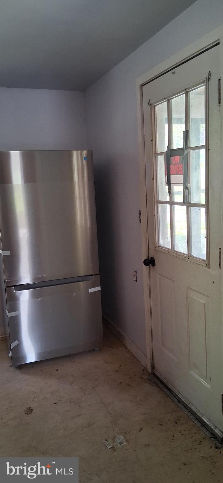 327-329 West Main Street Everett, PA 15537 - Photo 45 of 81 a refrigerator freezer sitting in a kitchen