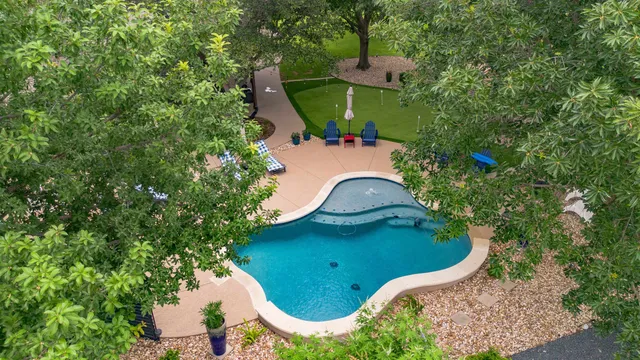 an aerial view of a swimming pool