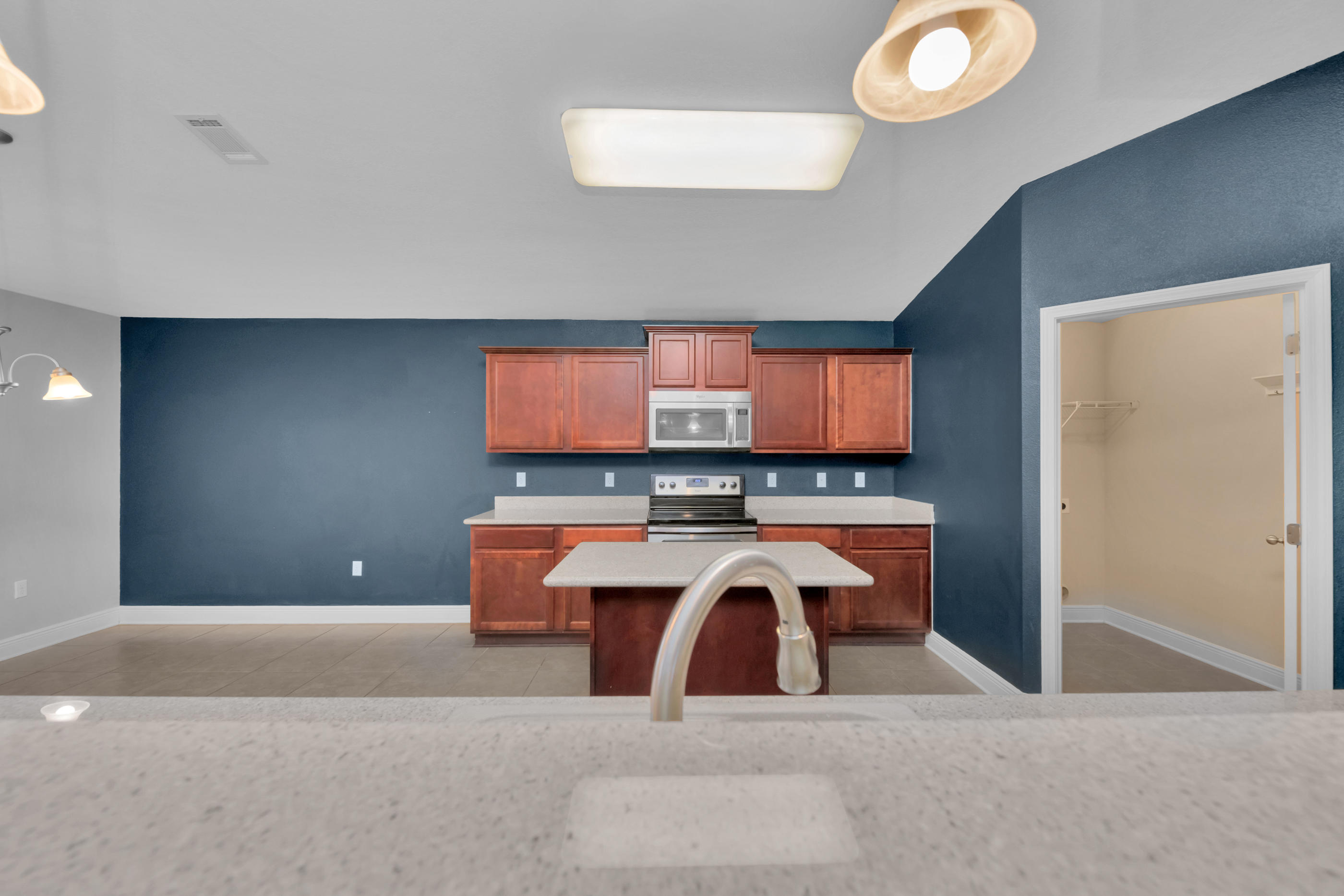 4583 Hermosa Road Crestview, FL 32539 - Photo 13 of 24 a view of a room with a projector and screen