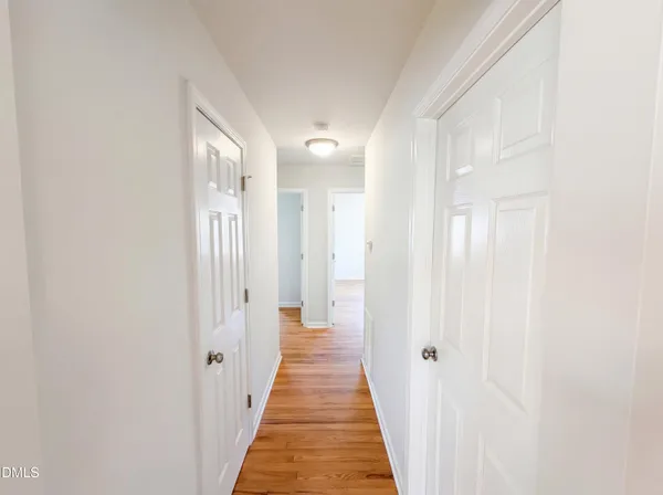 a view of a bathroom from the hallway