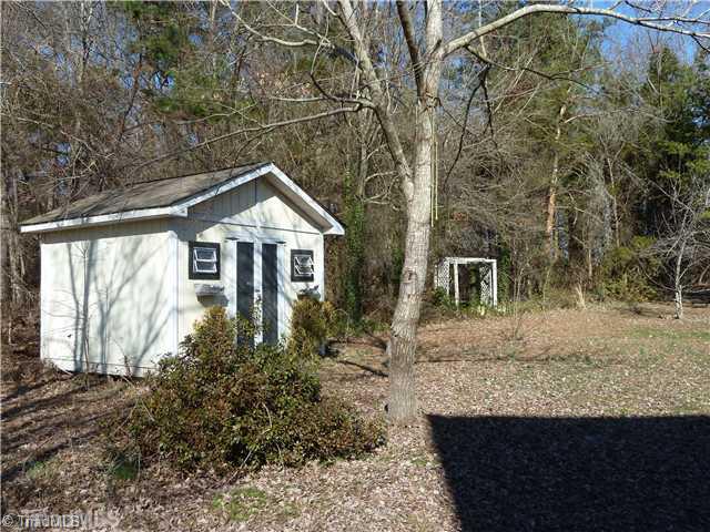 3601 Single Leaf Court High Point, NC 27265 - Photo 4 of 16 Storage. Partially wooded backyard with cottage-shed storage