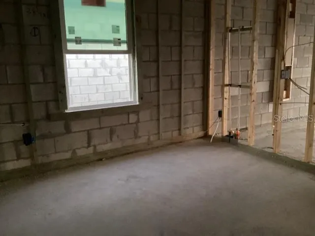 an empty room with sliding door