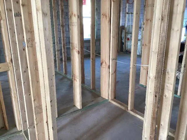 a view of a room with a large window