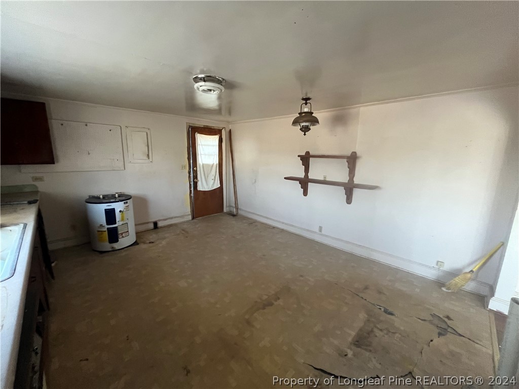 1712 Hayes Road Spring Lake, NC 28390 - Photo 13 of 13 a view of a room with gym equipment