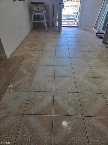 a bathroom with a shower and a sink