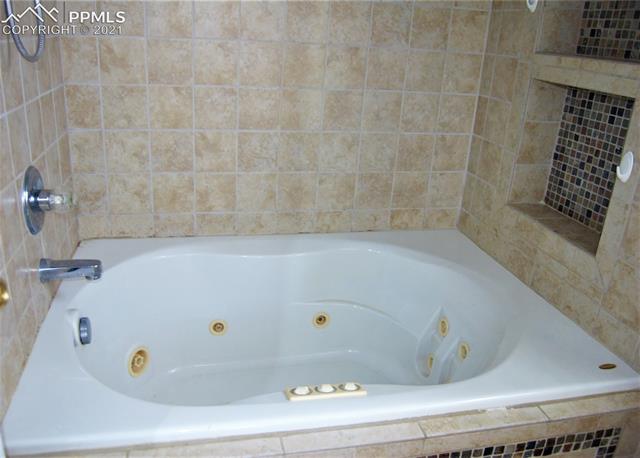 7560 Coffee Road Peyton, CO 80831 - Photo 14 of 17 Jetted tub in Master bath