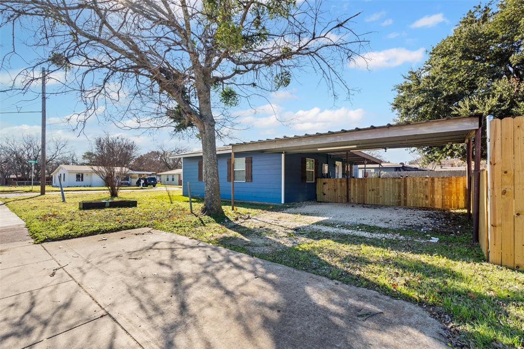 902 Turner Street Cleburne, TX 76033 - Photo 2 of 33 a view of a house with backyard porch and sitting area