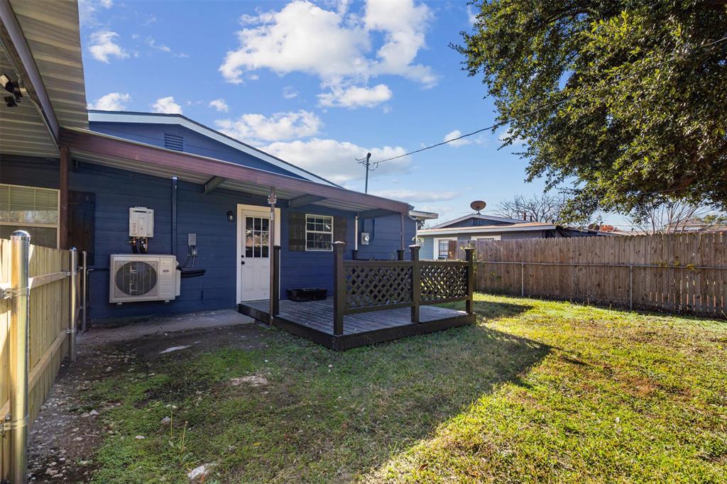 902 Turner Street Cleburne, TX 76033 - Photo 26 of 33 a view of backyard with trampoline