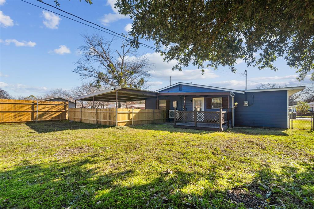 902 Turner Street Cleburne, TX 76033 - Photo 27 of 33 a front view of a house with a yard