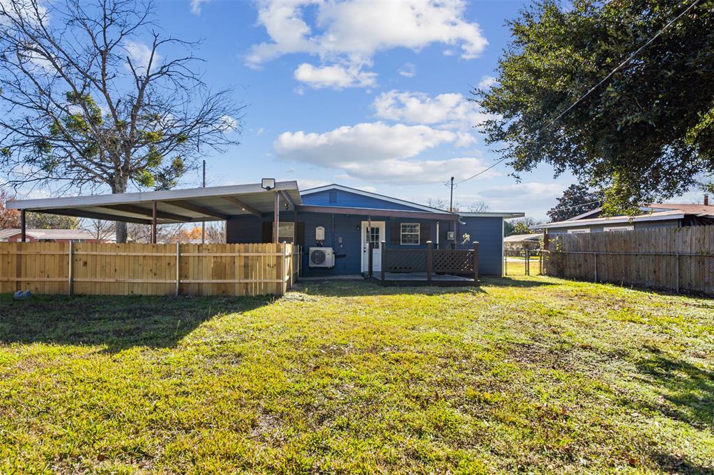 902 Turner Street Cleburne, TX 76033 - Photo 28 of 33 a front view of a house with a yard