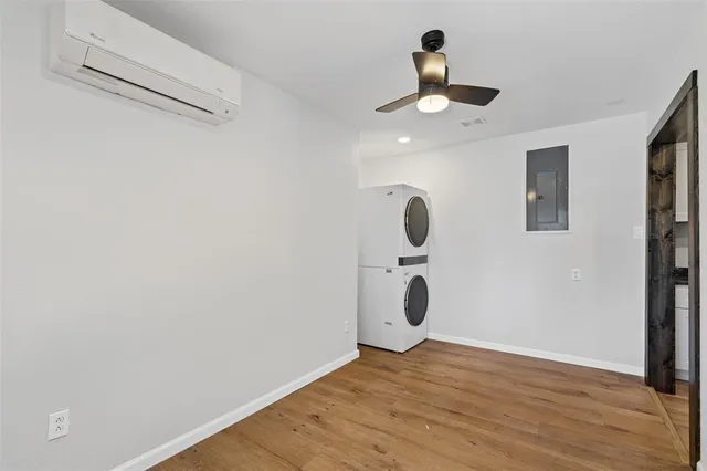 a view of a livingroom with wooden floor