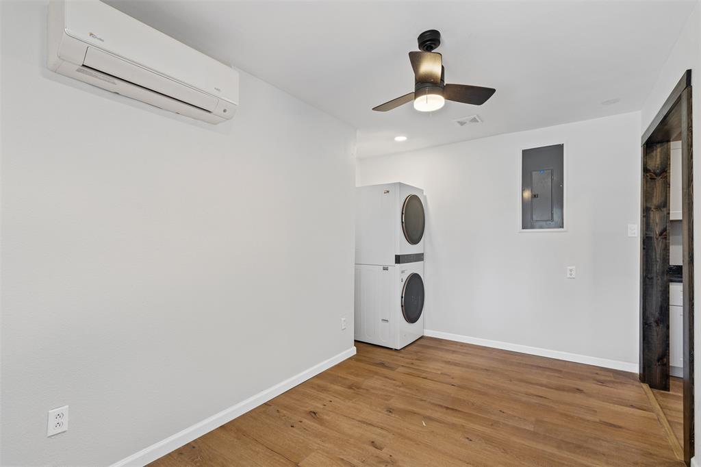 902 Turner Street Cleburne, TX 76033 - Photo 10 of 33 a view of a livingroom with wooden floor