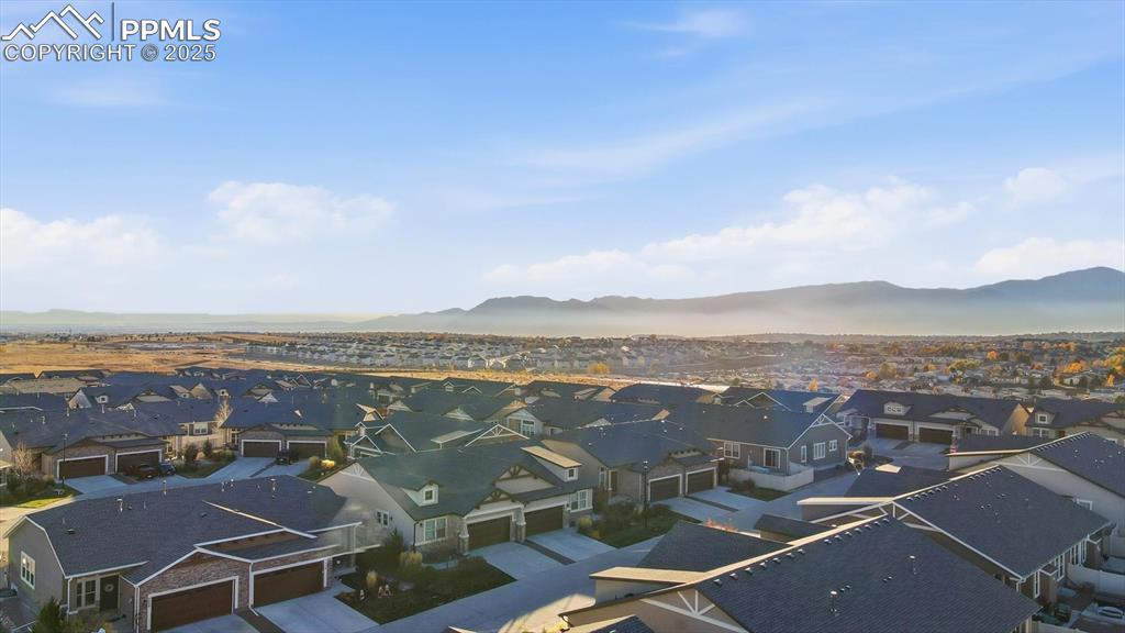 4456 Hessite Loop Colorado Springs, CO 80938 - Photo 2 of 42 an aerial view of residential building with outdoor space