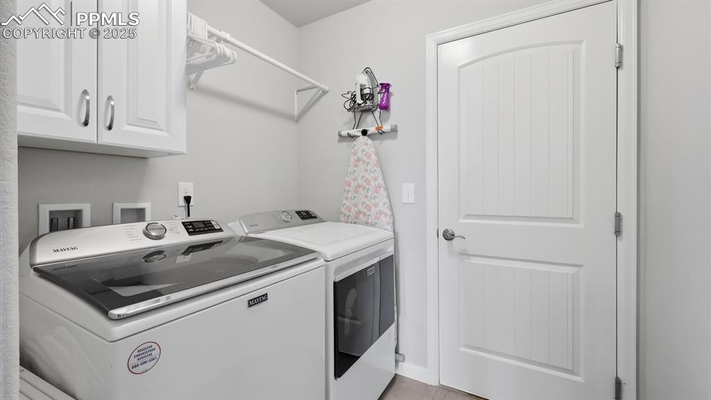 4456 Hessite Loop Colorado Springs, CO 80938 - Photo 35 of 42 a utility room with sink dryer and washer