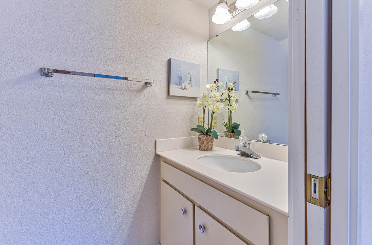2 Geary Circle Salinas, CA 93907 - Photo 14 of 29 a bathroom with a sink vanity and a mirror