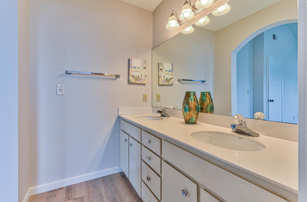 2 Geary Circle Salinas, CA 93907 - Photo 20 of 29 a bathroom with a sink a vanity and a mirror