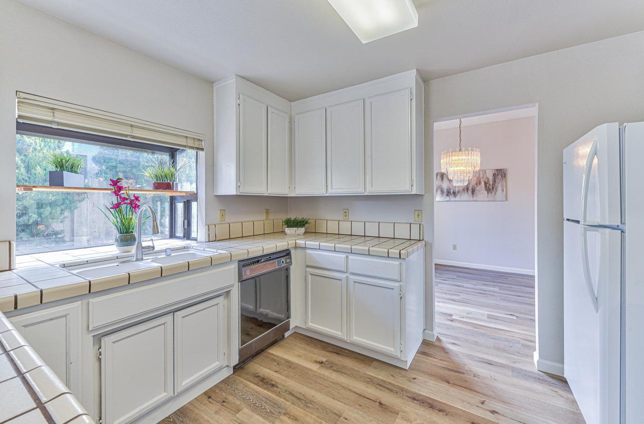 2 Geary Circle Salinas, CA 93907 - Photo 9 of 29 a kitchen with a sink stove and refrigerator