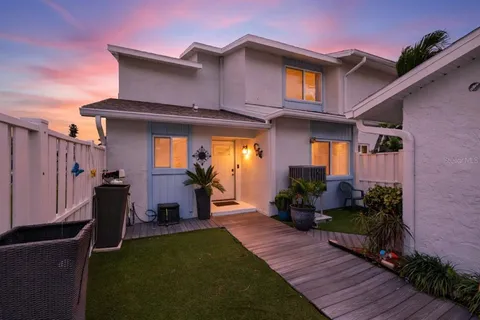 a view of a house with a patio