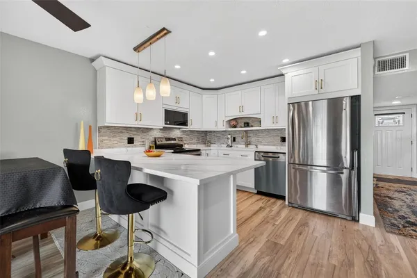 $375,000 | 6537 Cape Hatteras Way Northeast, Unit 1, St. Petersburg, FL 33702