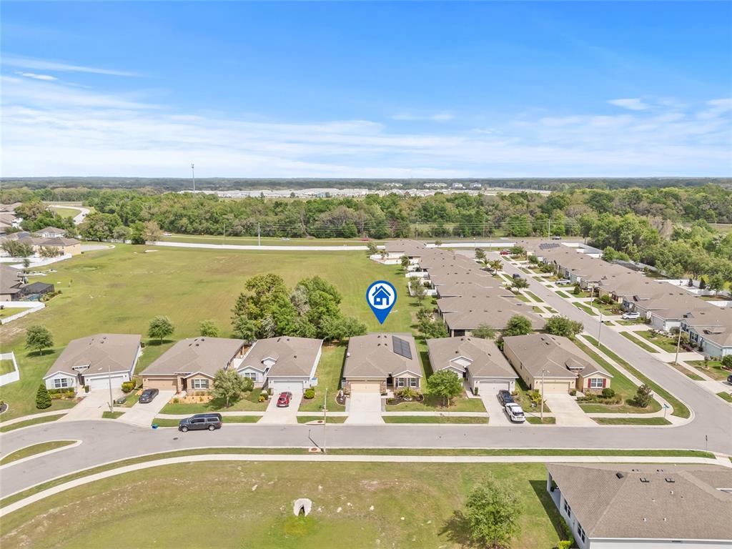 13675 Paddington Way Spring Hill, FL 34609 - Photo 33 of 36 a view of a city with an ocean beach