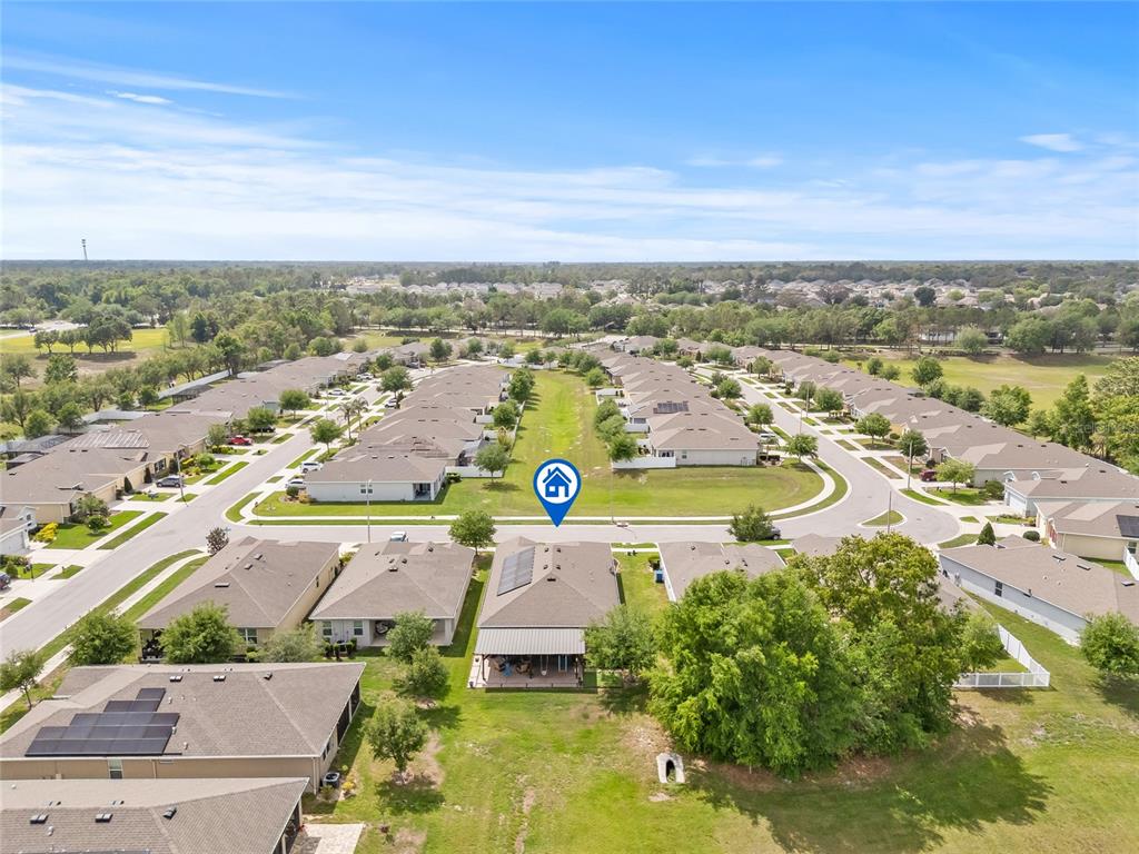 13675 Paddington Way Spring Hill, FL 34609 - Photo 34 of 36 an aerial view of residential houses with outdoor space