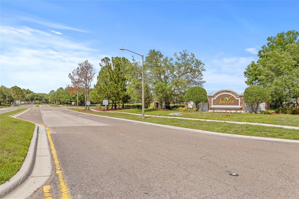 13675 Paddington Way Spring Hill, FL 34609 - Photo 36 of 36 a view of building with trees in the background
