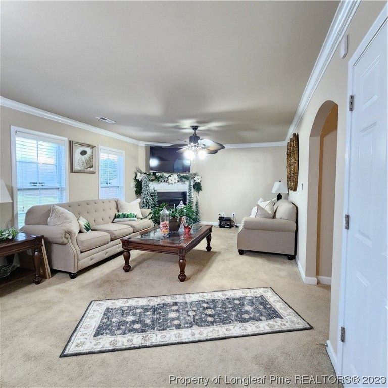332 United Road Raeford, NC 28376 - Photo 5 of 31 a living room with furniture and a rug