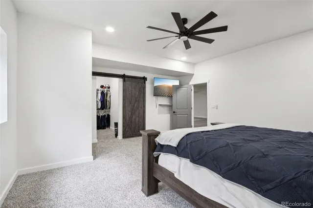 a bathroom with a shower and a sink