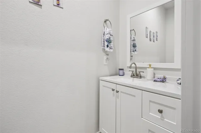 a patio with a table and chairs