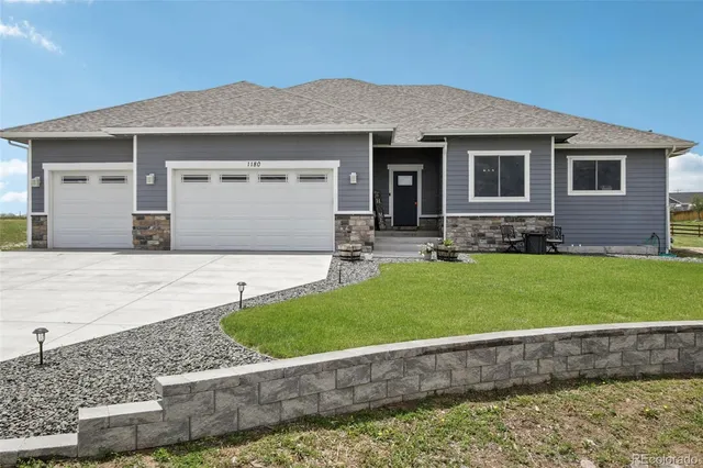 a view of a terrace with a lake view