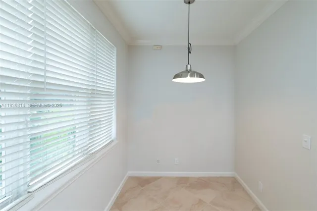 a view of a room with a window