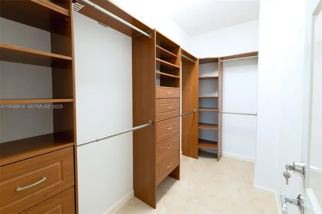 a view of an empty walk in closet