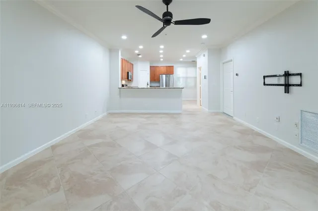 a view of a kitchen and a window