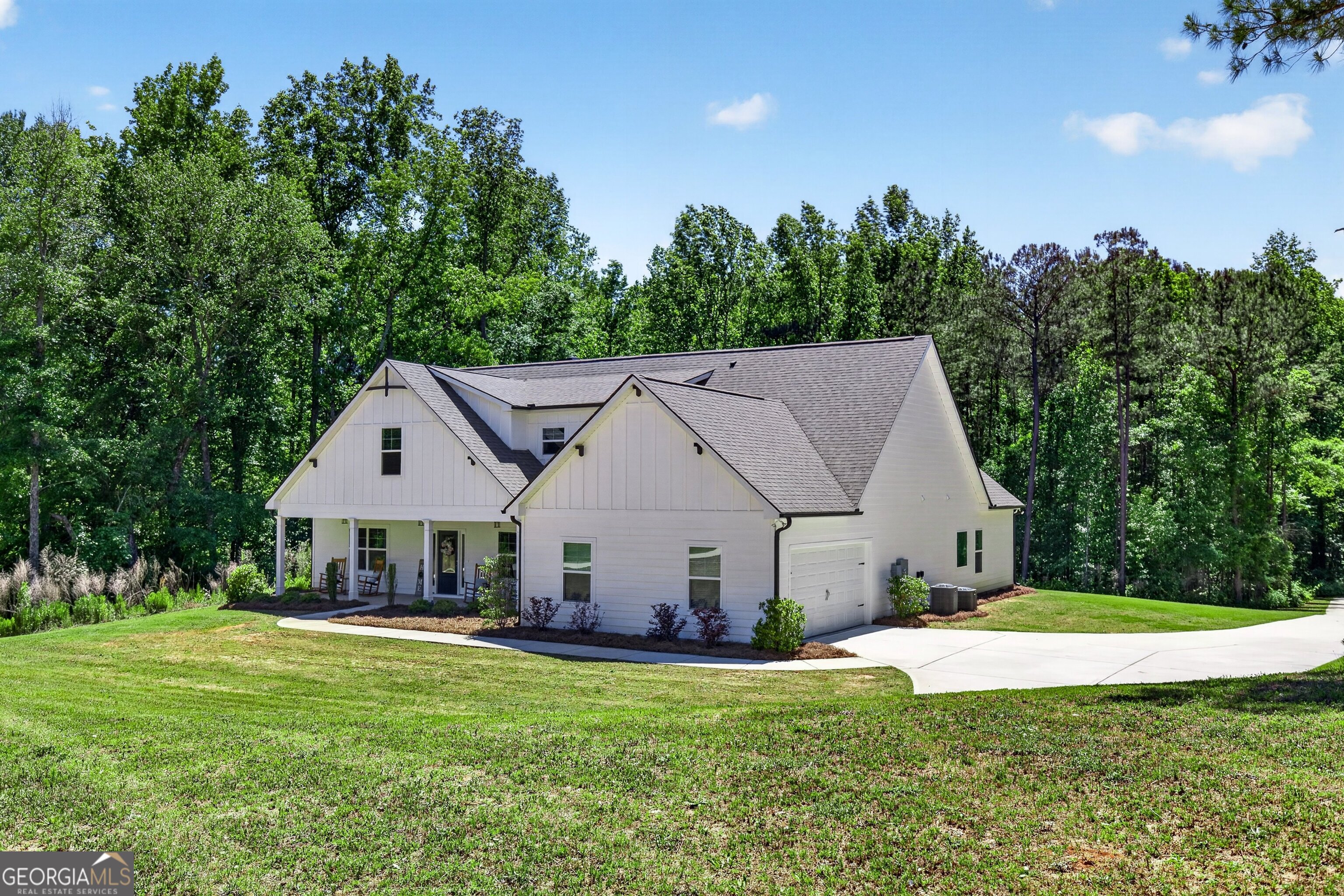 1764 Luther Bailey Road Senoia, GA 30276 - Photo 8 of 63 a aerial view of a house with swimming pool next to a big yard