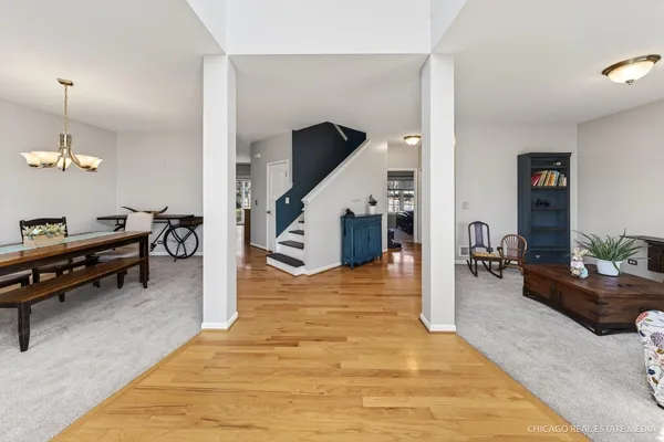 a view of a livingroom with furniture and a livingroom with furniture