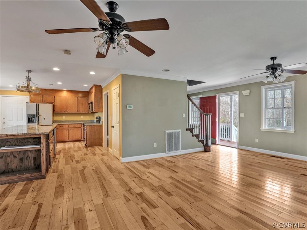 22157 Rowanty Road Carson, VA 23830 - Photo 5 of 34 a view of an empty room with a window and wooden floor