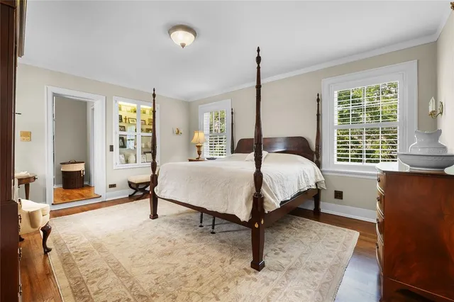 a view of a house with sitting area and garden