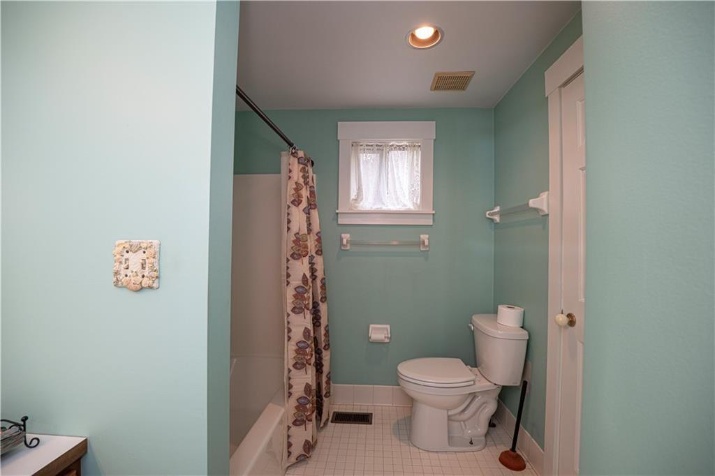 15 Ridgemead Fields Drive Plum, PA 15147 - Photo 13 of 32 a bathroom with a toilet a sink and shower
