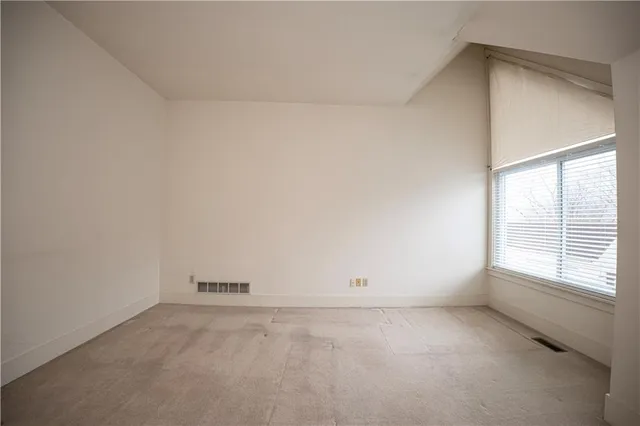 an empty room with a window