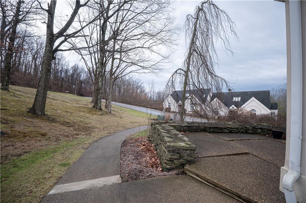 15 Ridgemead Fields Drive Plum, PA 15147 - Photo 20 of 32 a front view of a house with garden