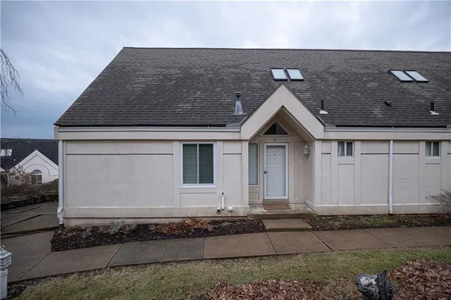 a house view with a garden space