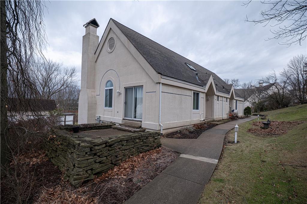15 Ridgemead Fields Drive Plum, PA 15147 - Photo 24 of 32 a view of a white house with large windows