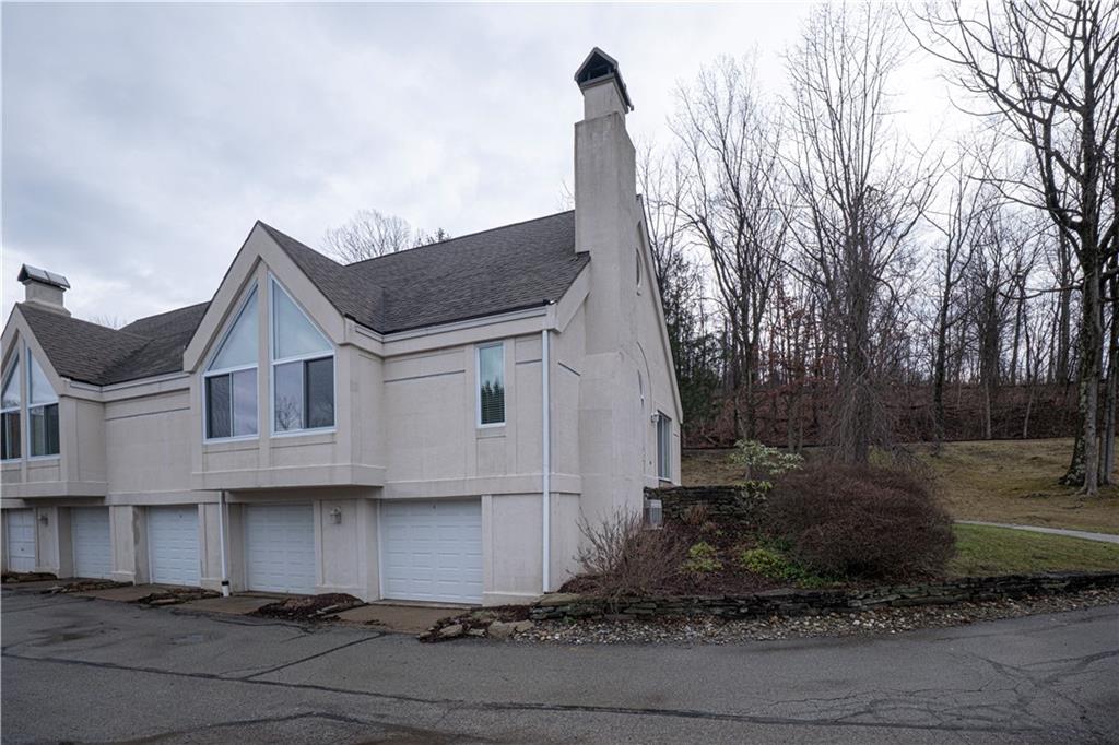 15 Ridgemead Fields Drive Plum, PA 15147 - Photo 25 of 32 a view of a white house with a yard and large tree